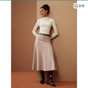 Chic and elegant flared maxi skirt by OGL. Ideal for versatile styling.